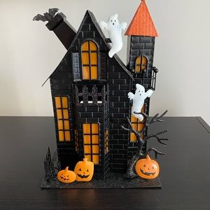 Halloween tin house decoration.